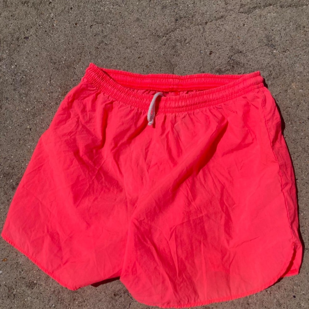 Bright pink running shorts